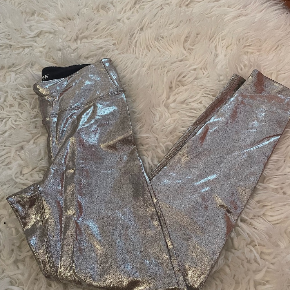 NWOT. silver glitter leggings.